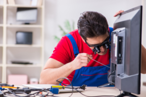 The Mobile Shop technician repairing a device in Huddersfield
